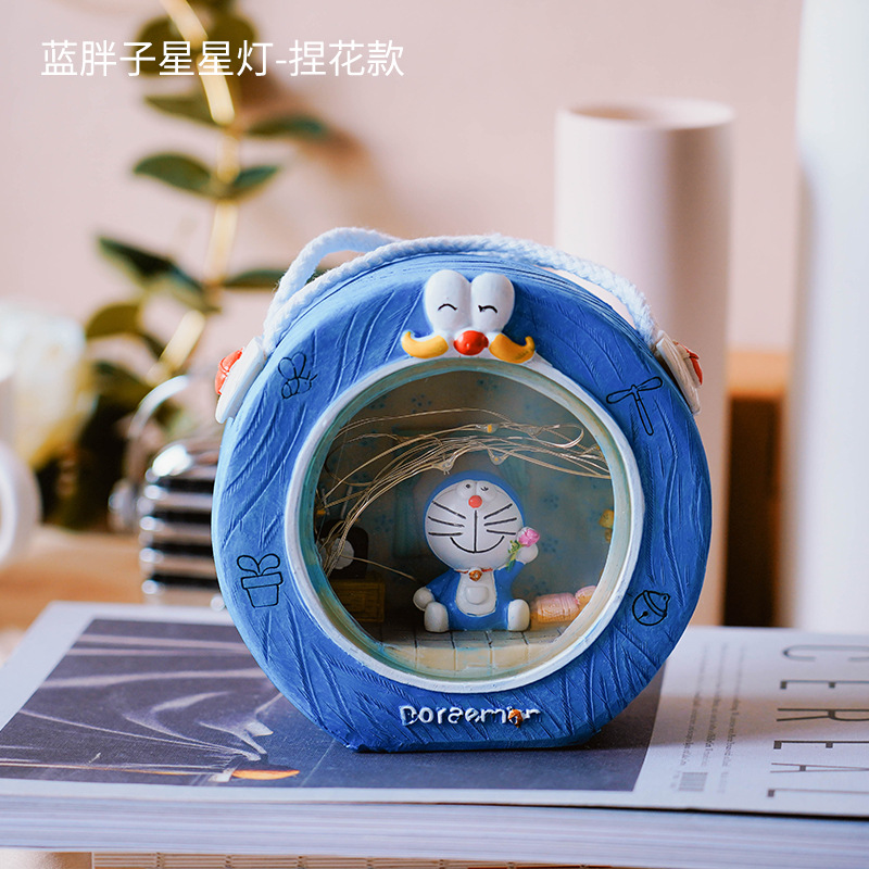 刺された猫-花を持つ