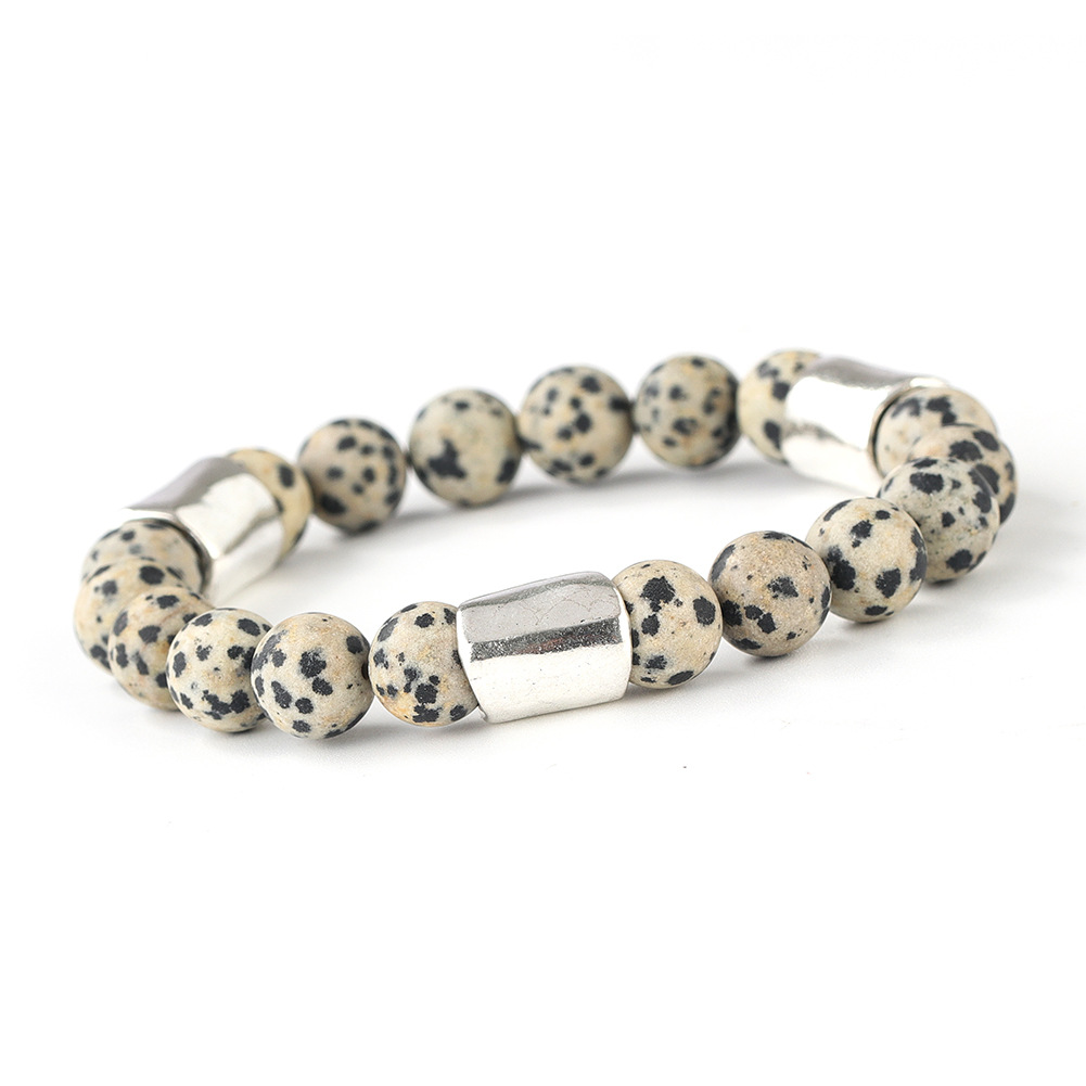 斑石 (銀色のボタン)