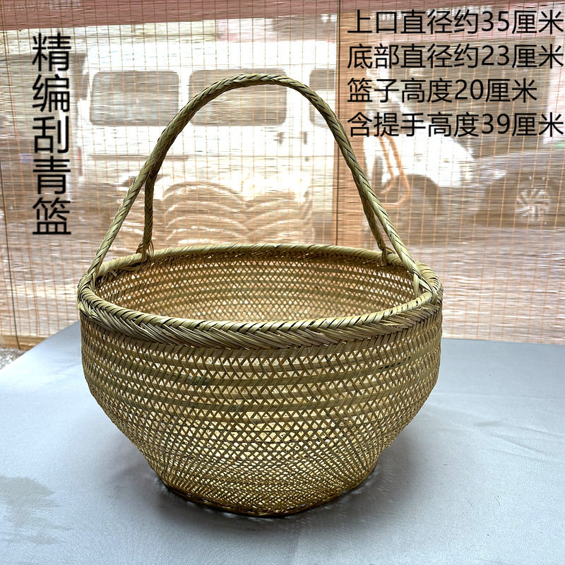 細かく編まれた丸い緑色のシルクバスケット