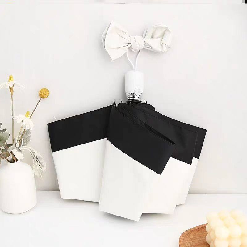 白いトップと黒いエッジ [自動的に厚くなった黒い接着剤]