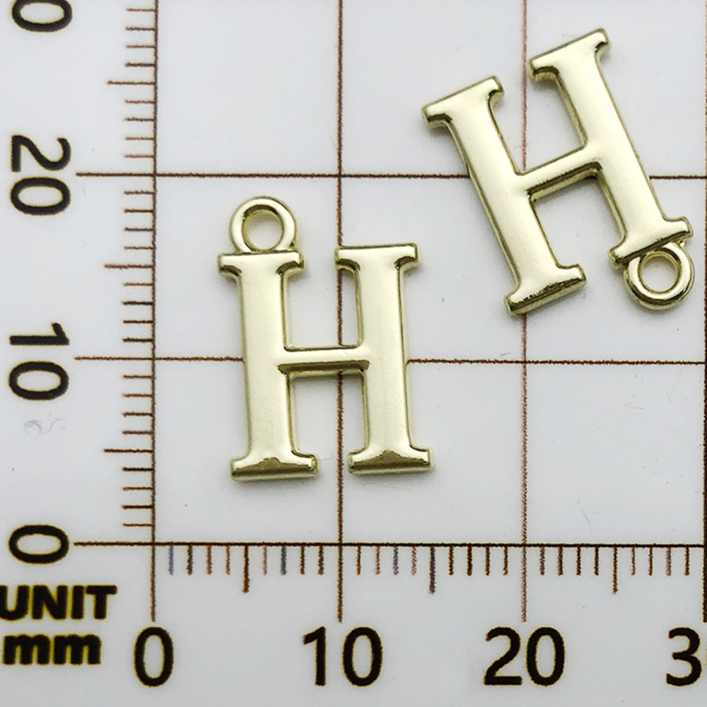 1 kc ゴールドラックメッキ文字 H-11x16mm-1g