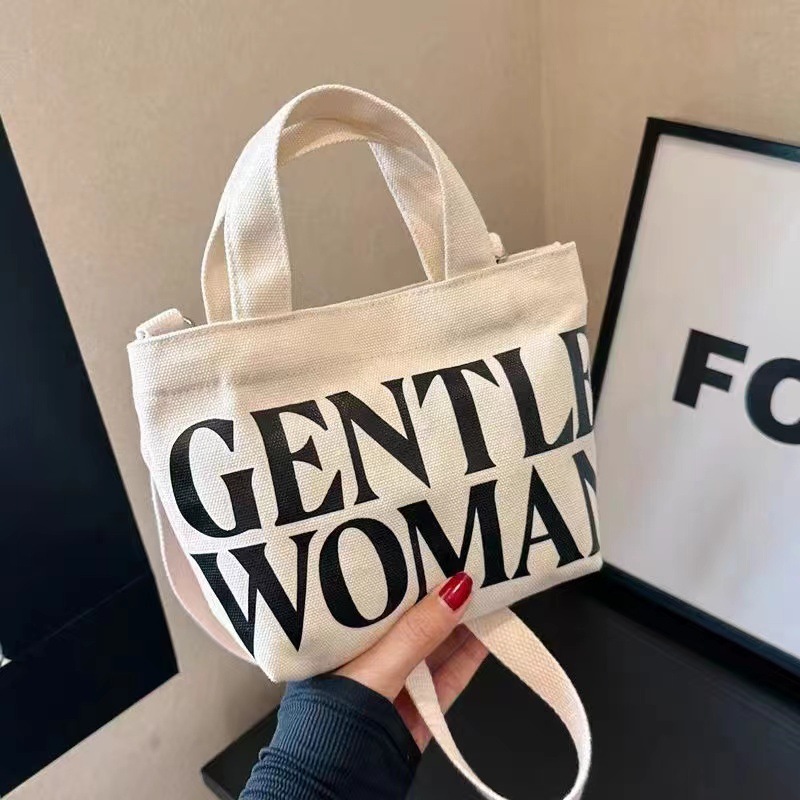 小包の大きいアルファベットの磁気ボタンの肩ベルト