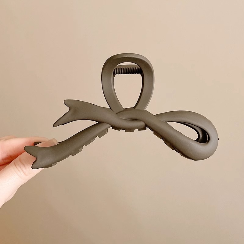 6 # 濃いカレー色の蝶結びクリップ