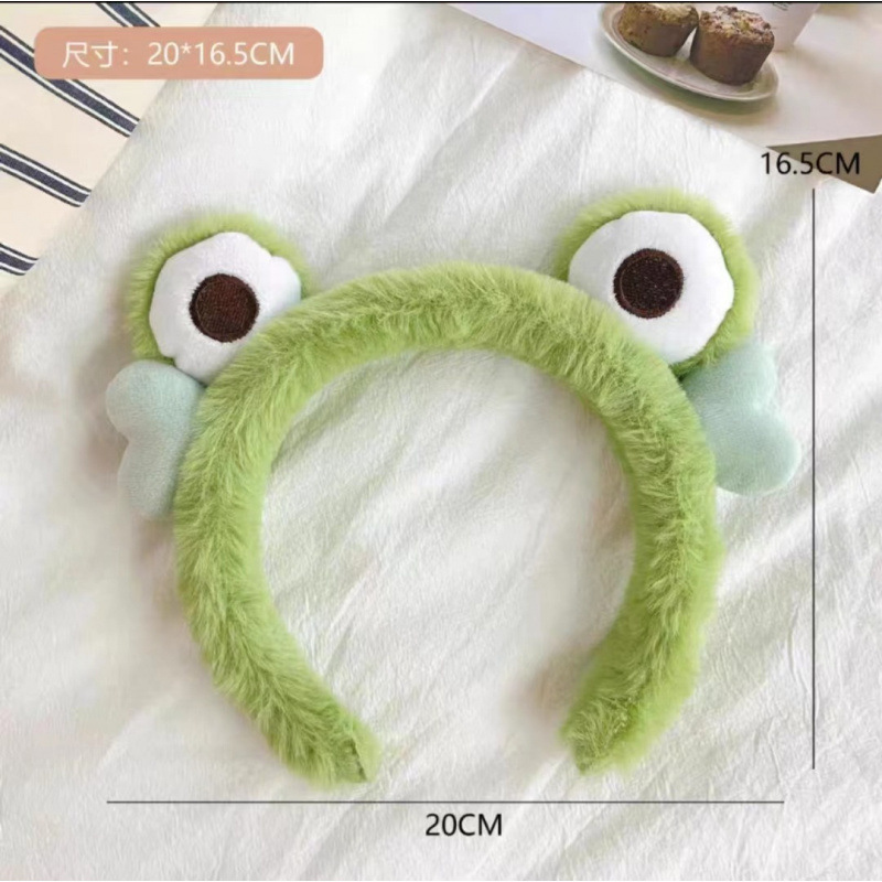 緑のカエルのヘッドバンド