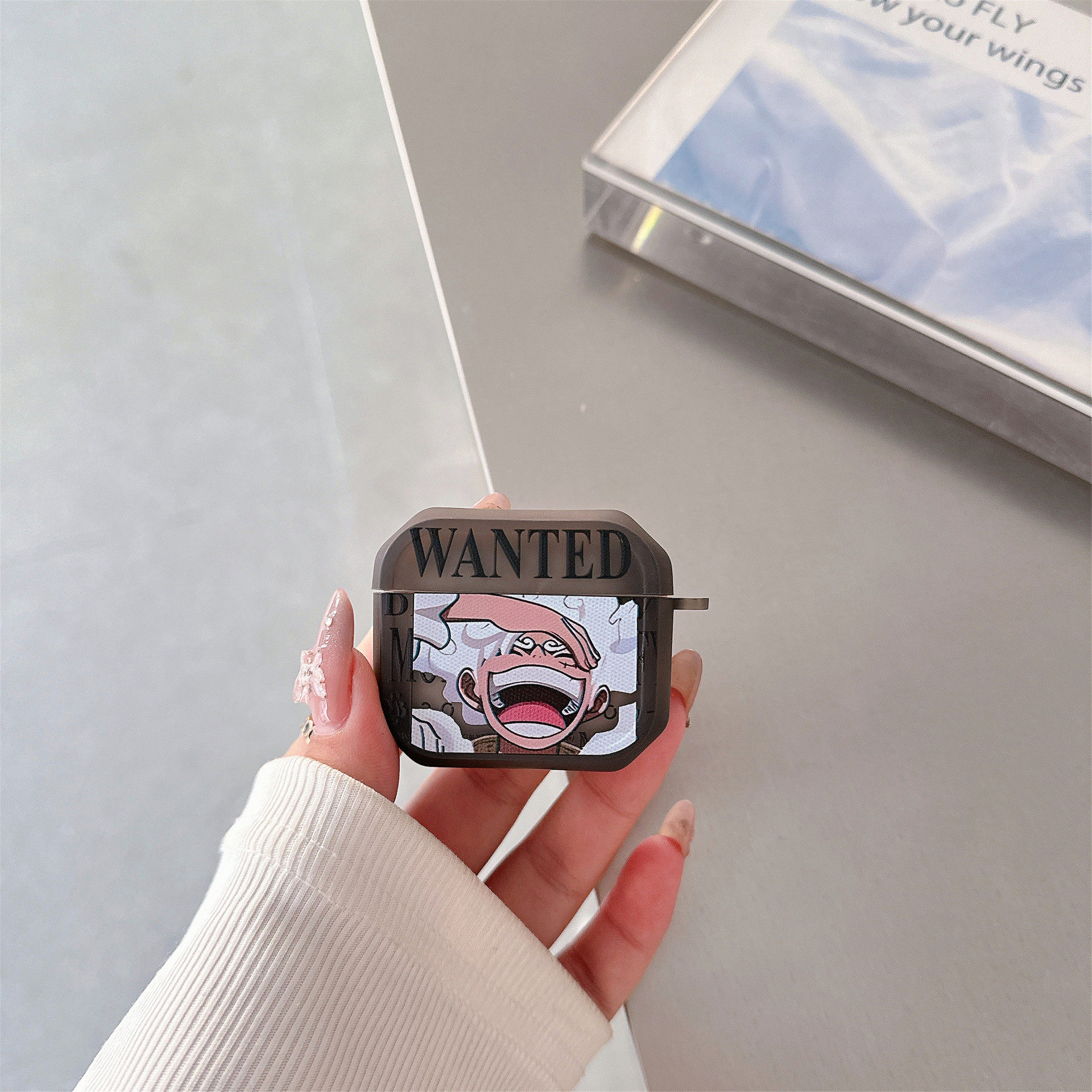 図4に示すように（スプリングバックル付き）