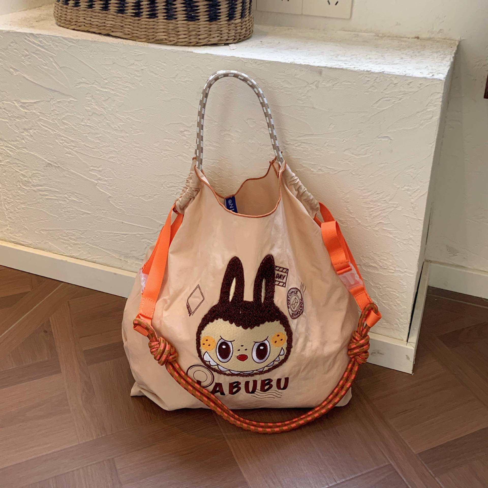 米色复古印章拉布布+橙色肩带