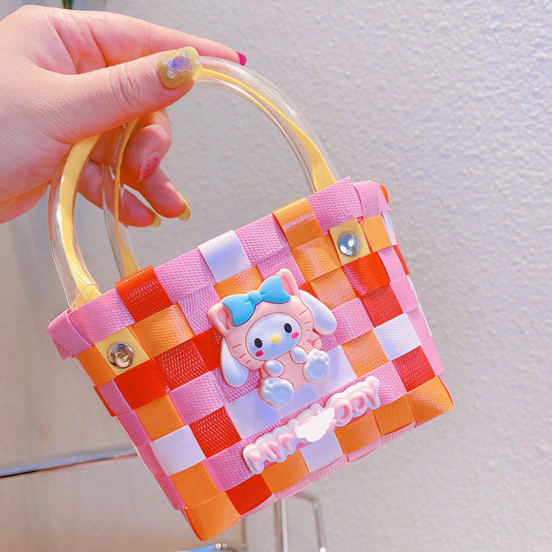 15.a04トランペットオレンジピンクの人形編みバッグ