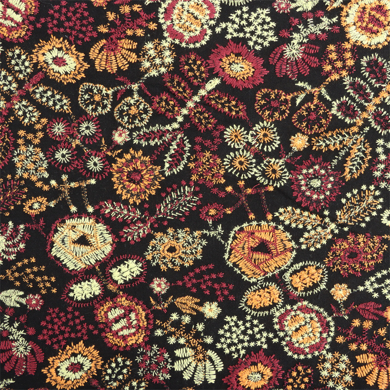 E20416-B 黒地に黄色（幅125cm、綿90％、麻10％）