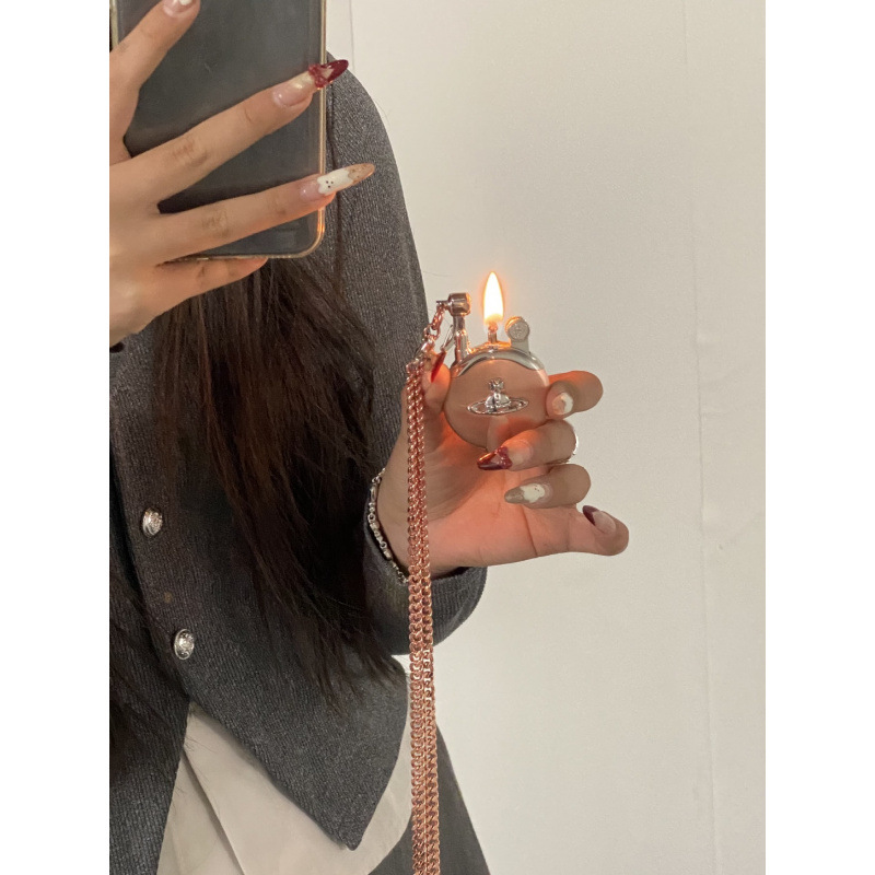 ローズゴールドのサターン ライター