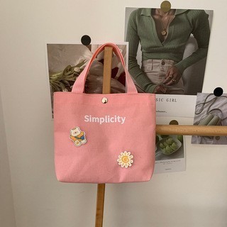 ピンクバッジ。