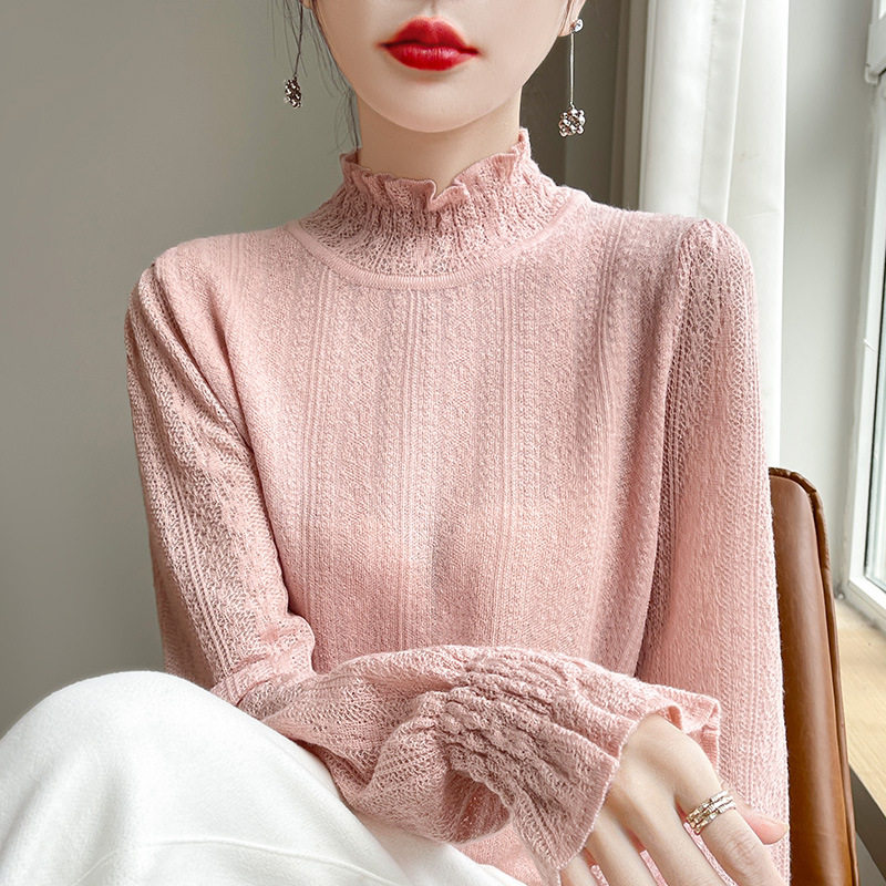 ピンクのセーター