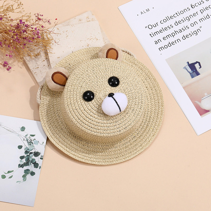 ベージュのクマ、耳、目、口