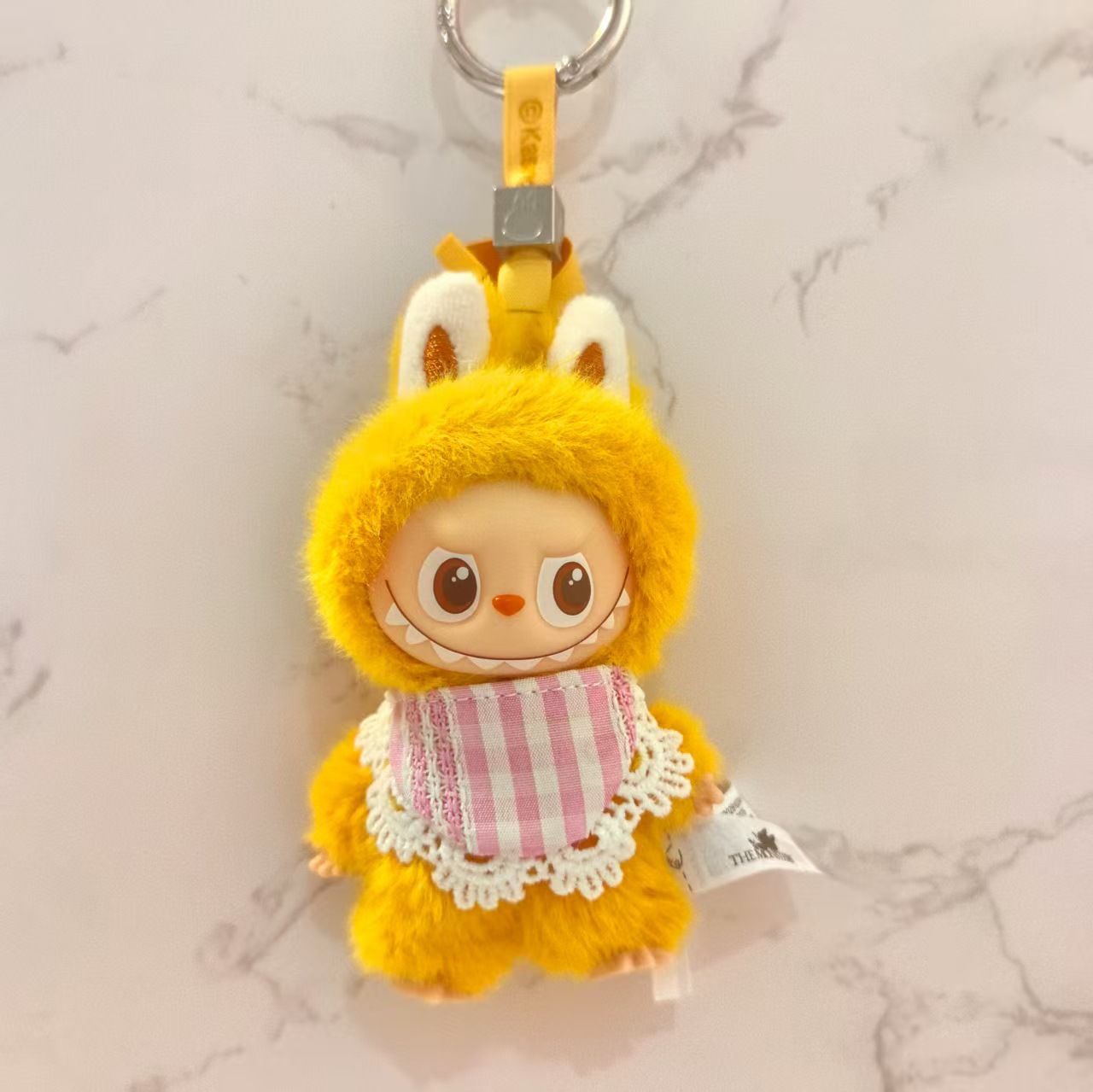 ピンクの唾液タオル