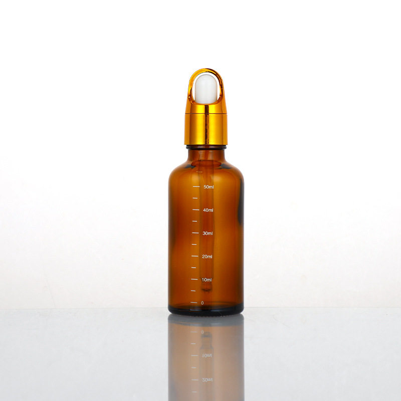 5ml 茶色の目盛り付きボトル、茶色のエッセンシャル オイル ボトル + ゴールド フラワー バスケット スポイト キャップ、ガラス