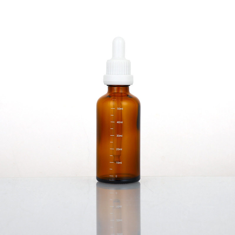 5ml 茶色の目盛り付きボトル、茶色のエッセンシャル オイル ボトル + 白い大きな頭の盗難防止リング、ガラス