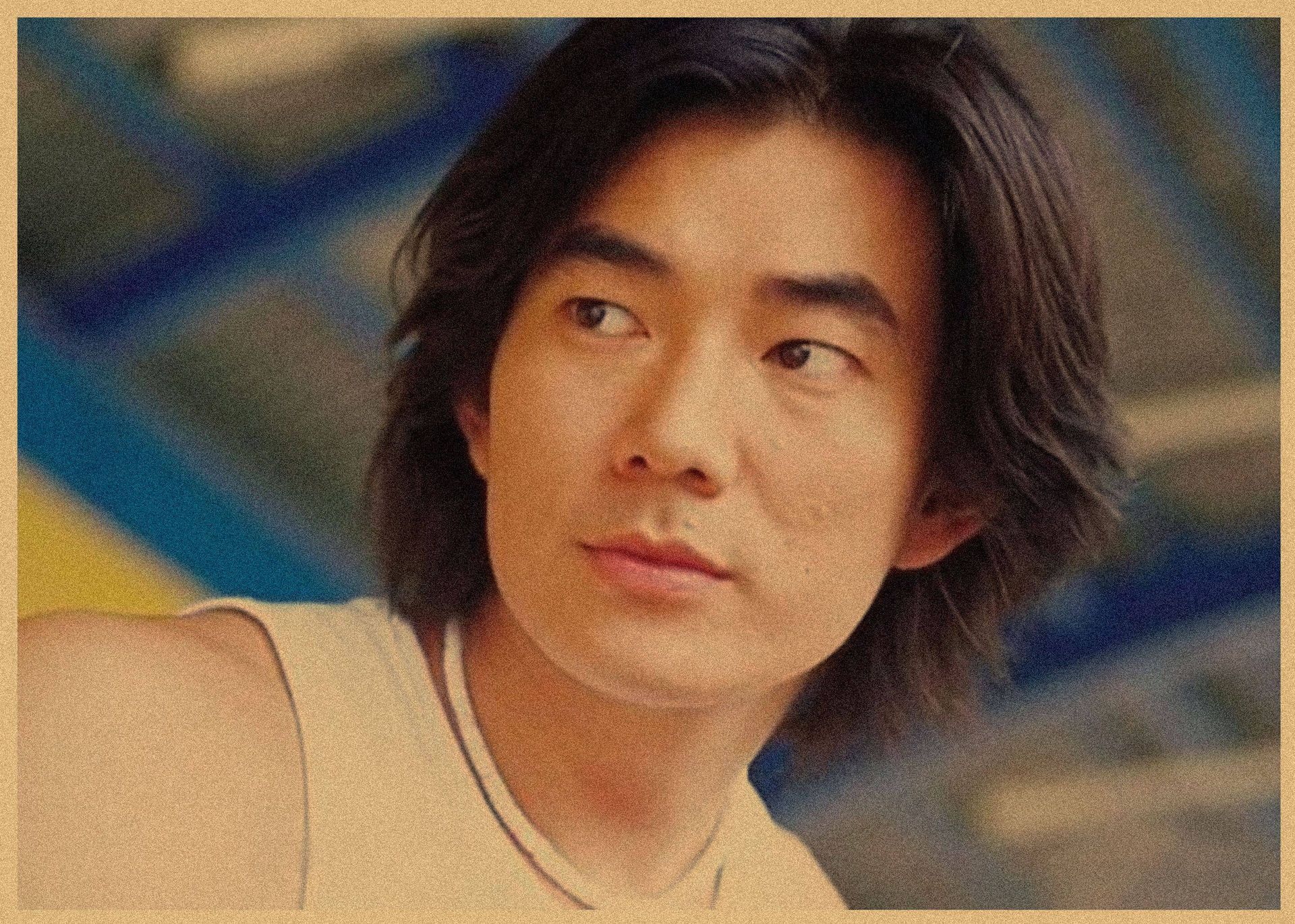 オレンジ色の任賢斉