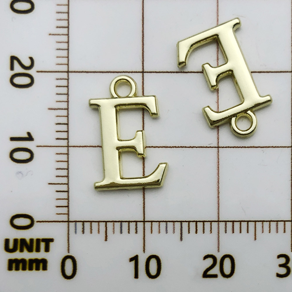 1 kc ゴールドラックメッキ文字 E-10x15mm-0.8g