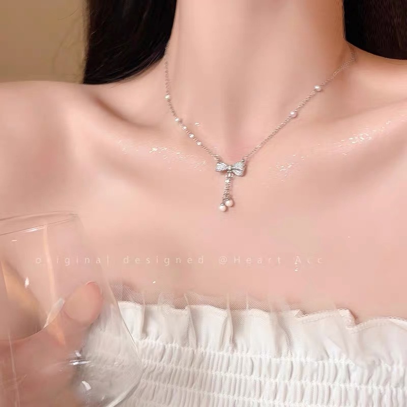タッセル蝶結びネックレス