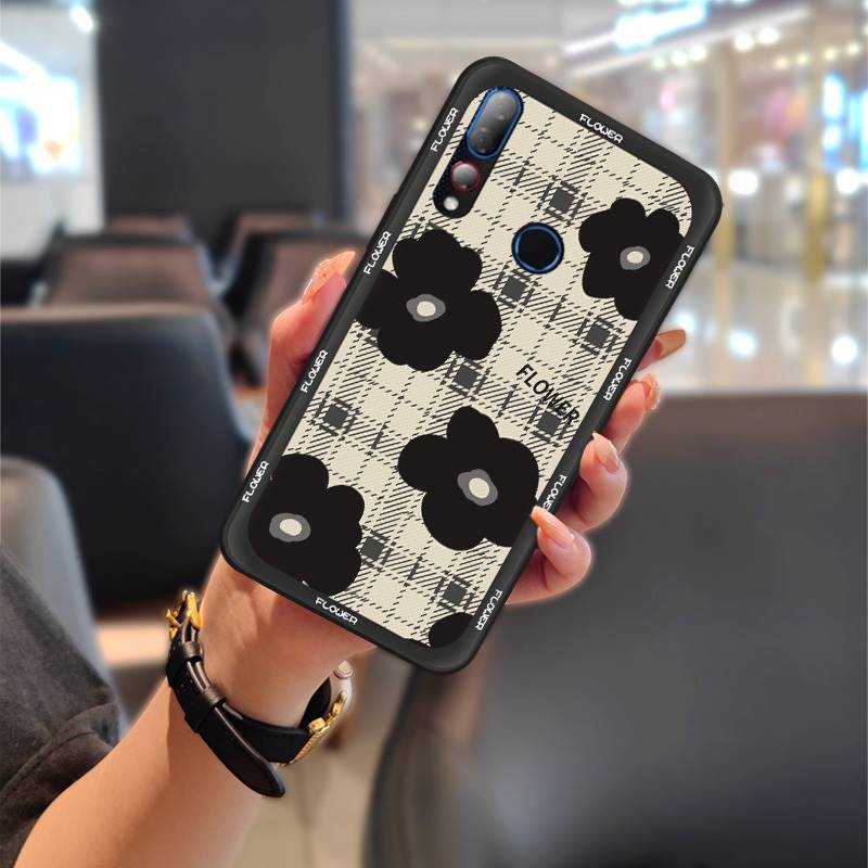 ブラックシェル - チェック柄の黒い花