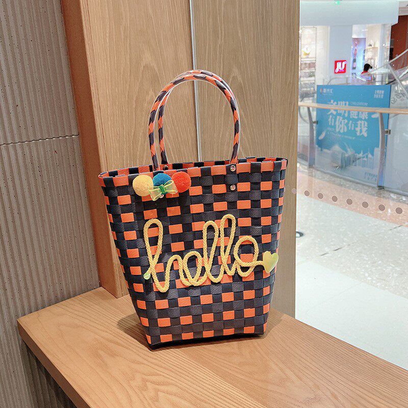 大きなブルーとオレンジのハローニットバッグ