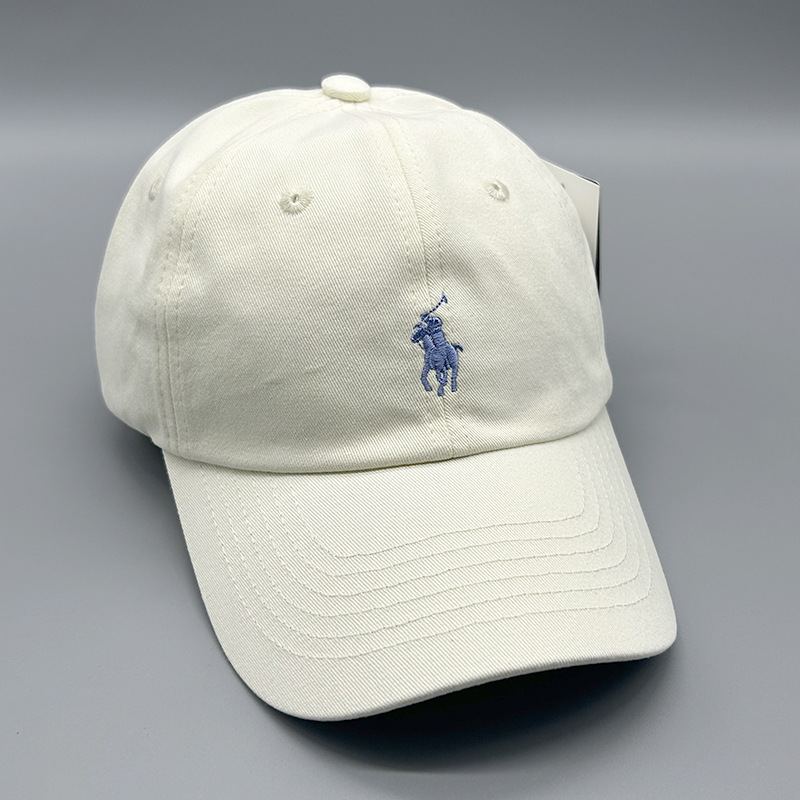 クリーミーホワイトのポロ