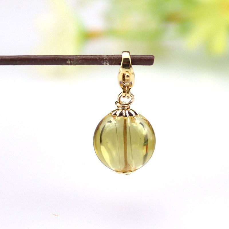 イエローの穴あきエッセンシャル オイル ビーズ ペンダント (ロブスター バックル スタイル)