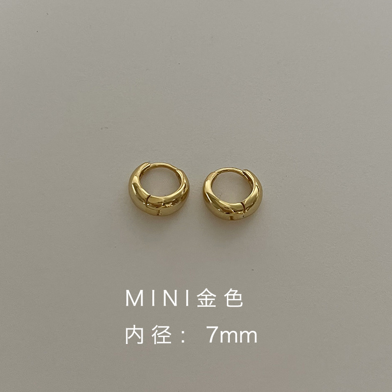 金色のminiタイプの耳ボタンのペア