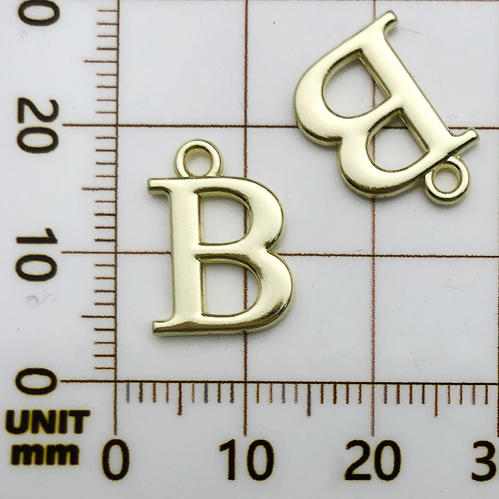 1 kc ゴールドラックメッキ文字 B-11x16mm-1g