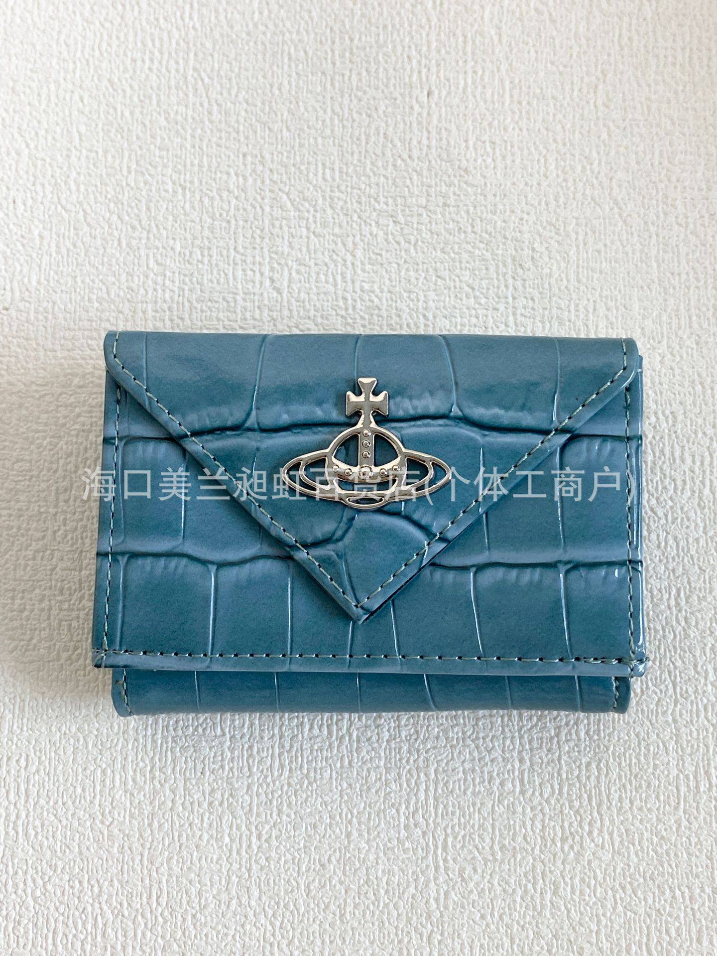 ブルーのクロコダイル柄トライアングルウォレット
