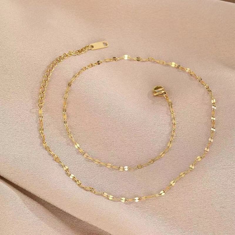 金色の魚の口のチェーン