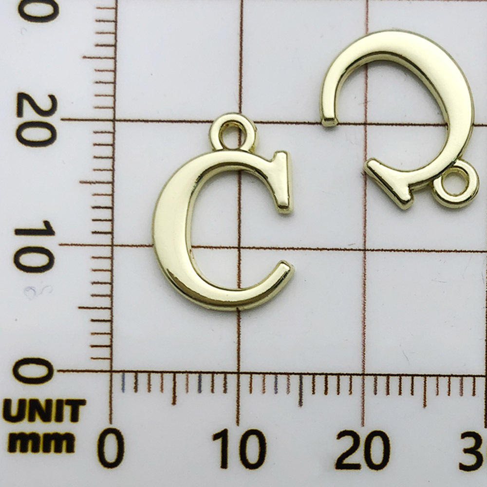 1 kc ゴールドラックメッキ文字 C-11x16mm-0.8g