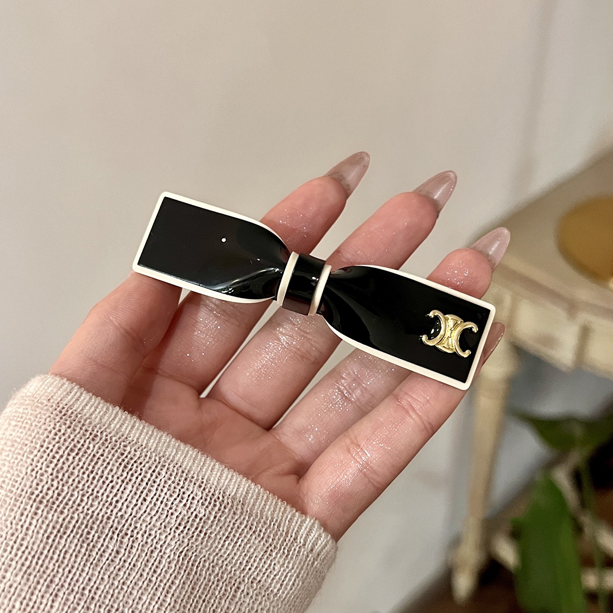黑色凯旋门金属蝴蝶结弹簧夹