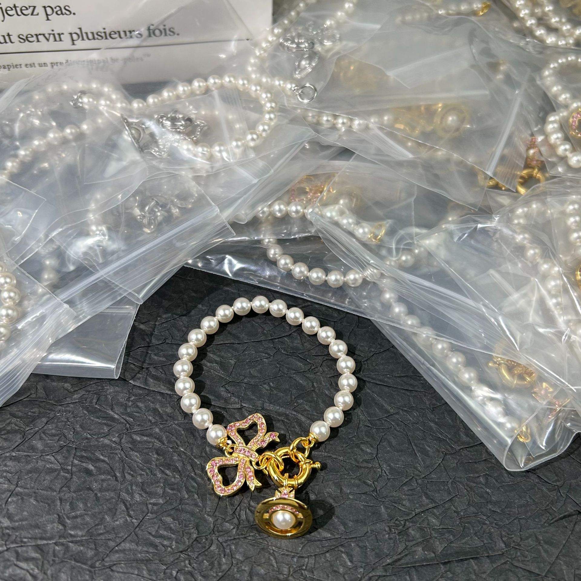 ゴールドサターンブレスレット'