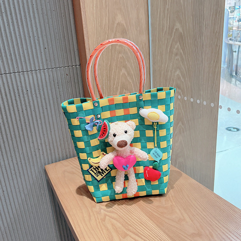 公仔の大きいサイズの緑色の編み物の包み