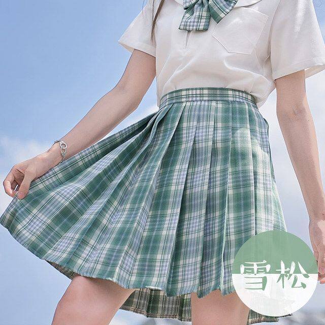 グリーンのチェック柄スカート+襟の花