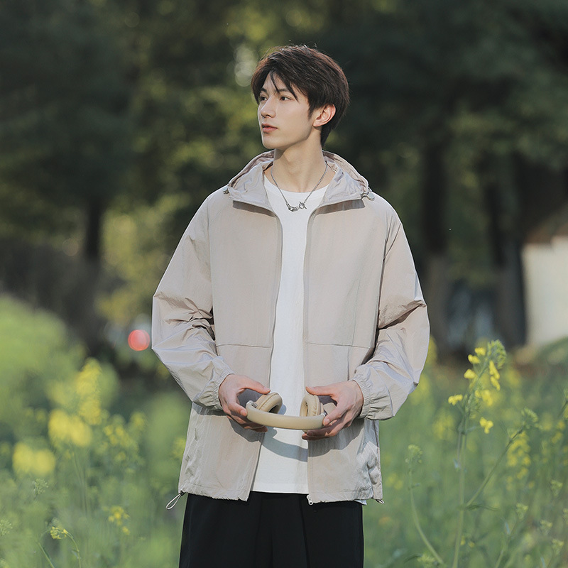 薄い灰色の男