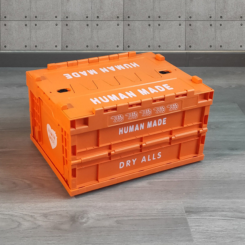 オレンジのトレンディなブランド人間製