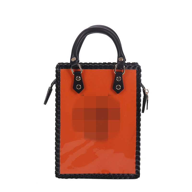 オレンジ色の手提げ + 本体材料バッグ