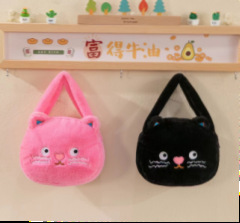 斑点のある猫のハンドバッグ